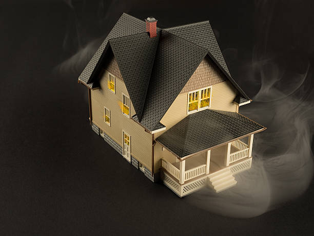 Model House in Smoke and Flames stock photo