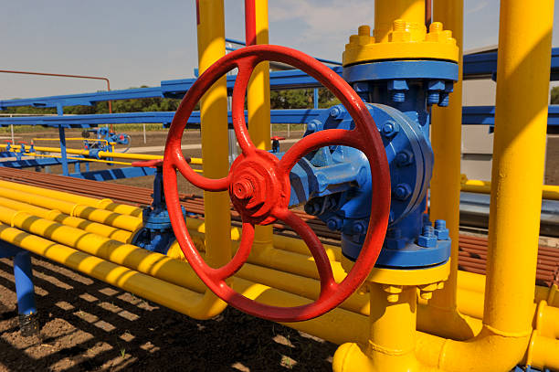 istock Handle gate valve with steel pipe on gas compressor station 490915196