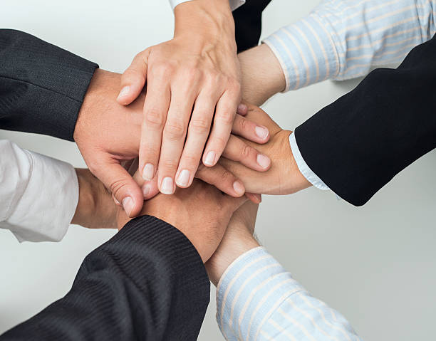 istock Business people putting hands together 490915272