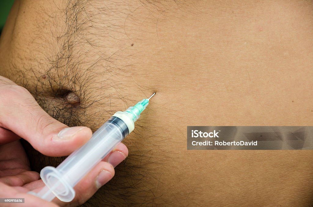 stomach injection insulin put under skin 2015 Stock Photo