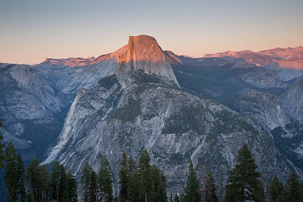 istock Sunset over famous Half Dome and surrounding views 490919326