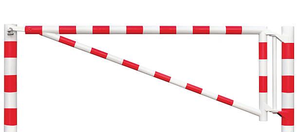 istock Gated Road Barrier Closeup, Roadway Gate Bar Bright White Isolated 490919652