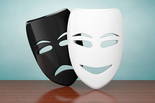 Old Style Photo. Tragicomic Theater Sad and Smile Masks Old Style Photo. Tragicomic Theater Sad and Smile Masks on the table tragicomedy stock pictures, royalty-free photos & images