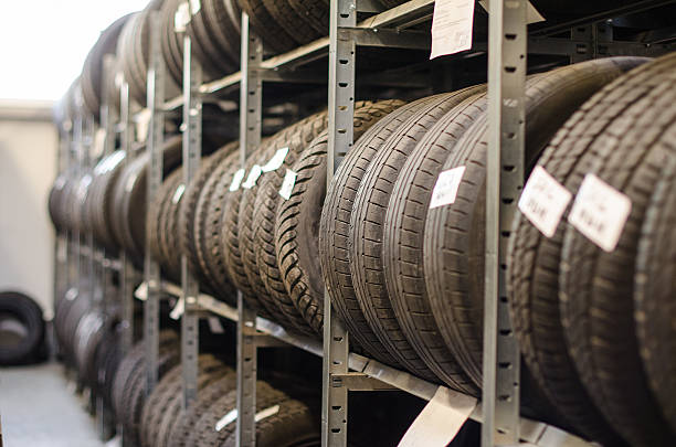istock Used old car tires at warehouse. 490927637
