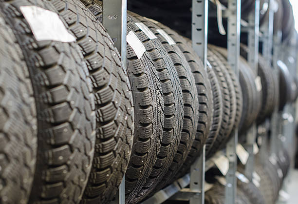 istock Used old car tires at warehouse. 490927645