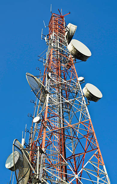 istock Telecommunication towers against blue sky 490930555
