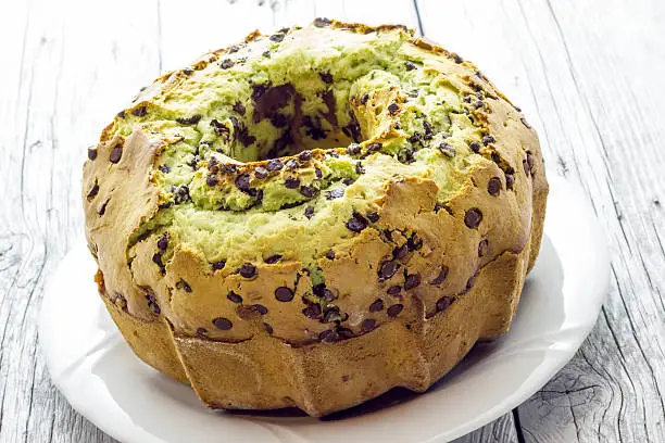 Photo of Donut with mint and drops of chocolate