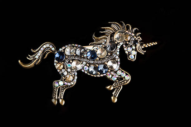 broche en la forma de unicorn - ornamented accessory fotografías e imágenes de stock