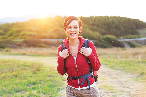 istock Young Woman hiking with backpack in the forest 490940208