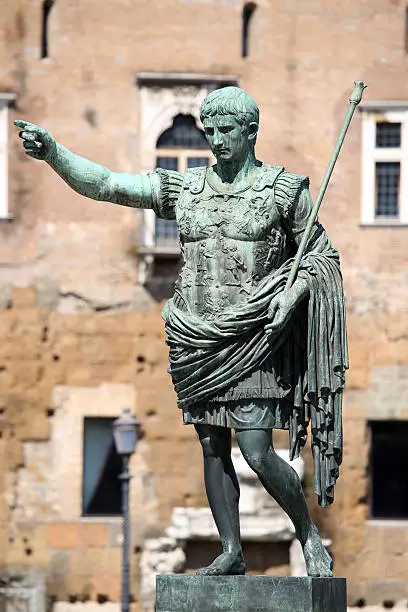 Statue S.P.Q.R. IMP CAESAR Augustus PATRIAE PATER on street Via dei Fori Imperiali, Rome, Italy