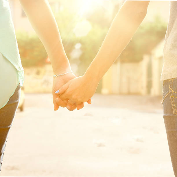 istock Homosexual couple Holding hands 490943726