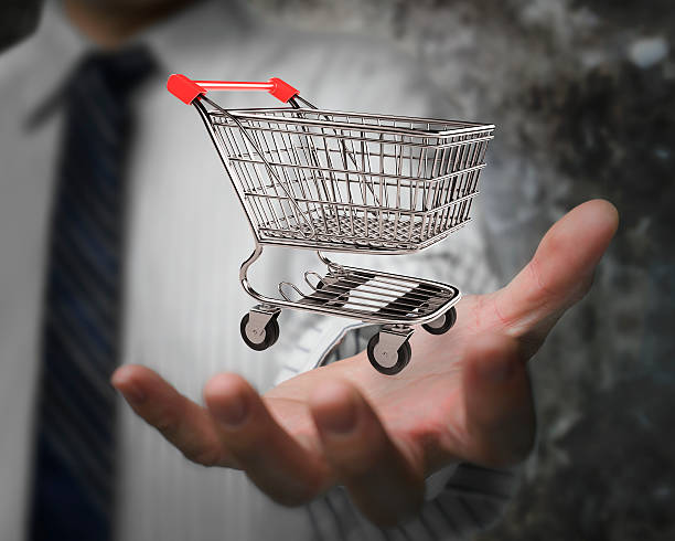 istock Businessman hand showing empty shopping cart 490944602