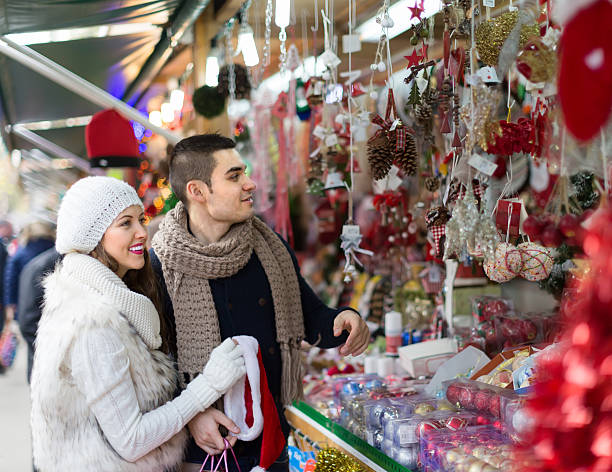 istock Young man with girlfriend at  X-mas market 490944908