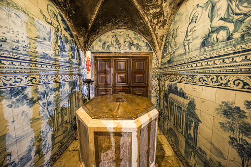 Lisbon, Portugal - September 21, 2015: Baptismal font in Sé de Lisboa - the Cathedral of Lisbon, Portugal.