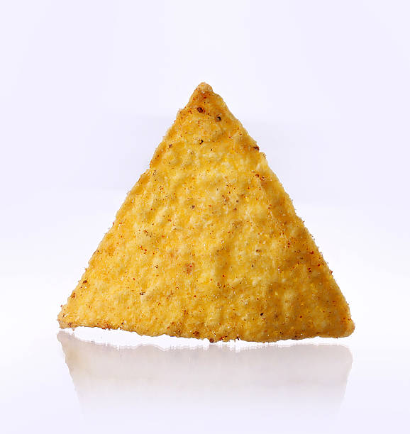 istock Mexican nachos chips, isolated on white background. Close up 490946212
