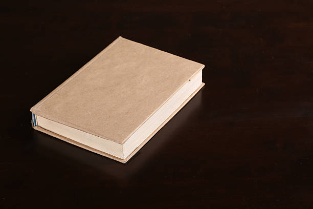 istock Top view on the book lying wood table 490957990