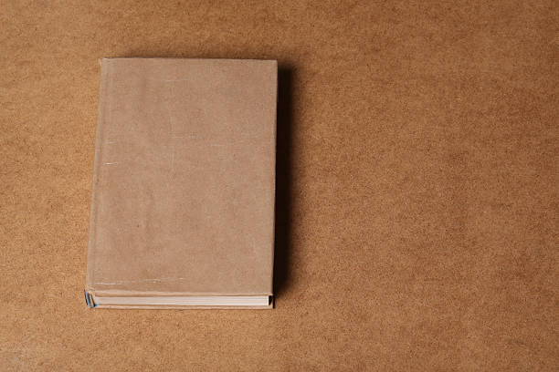 istock Top view on the book lying wood table 490958386