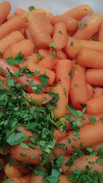 istock Baby carrot and parsley 490960538