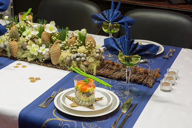 istock Christmas table with flower arrangement 490961042