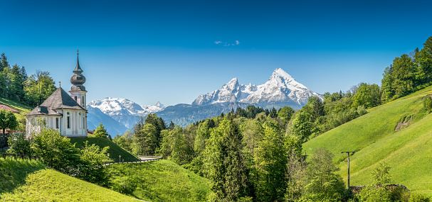 Beautiful mountain landscape in the Bavarian Alps with pilgrimage church of Maria Gern and Watzmann massif in the background, Nationalpark Berchtesgadener Land, Bavaria, Germany