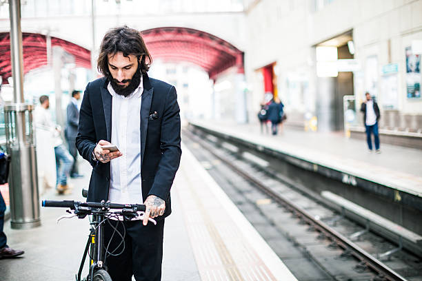 istock Commuter waiting the train with his bicycle 490964798