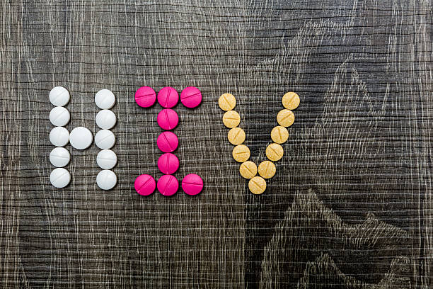 istock The word HIV(Human Immunodeficiency Virus) written whith pills 490965820