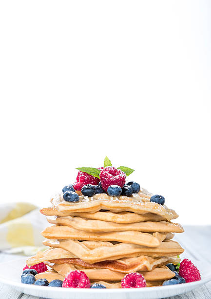 istock Homemade Waffles with mixed Berries (white background) 490965824