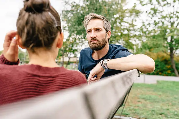 Photo of Father and Daughter talking