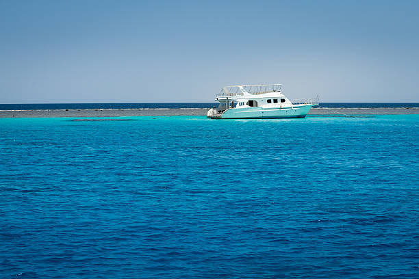 istock Boat anchored red sea 490970856