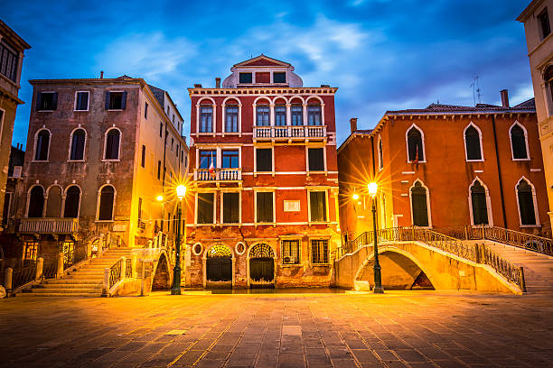 Amazing narrow canal in Venice in the evening, Italy