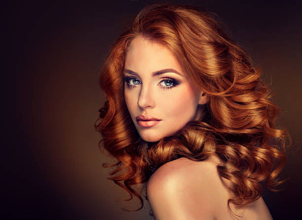 istock Girl model with long curly red hair. 490971442