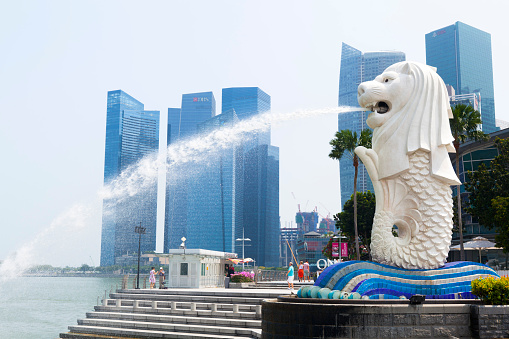 Singapore,Singapore - April 23,2015 : The Merlion fountain at daytime in Singapore on April 23,2015. Merlion is a imaginary creature with the head of a lion,seen as a symbol of Singapore.