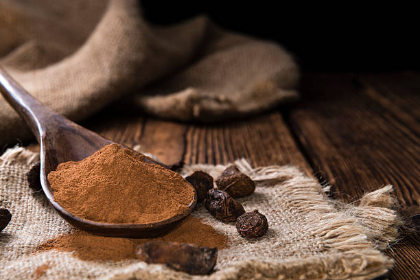 istock Cola Nut Powder on wooden background 490972788