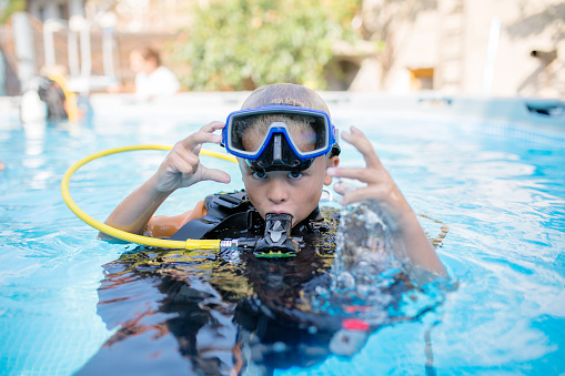 6 year old boy ready for scuba diving adventure