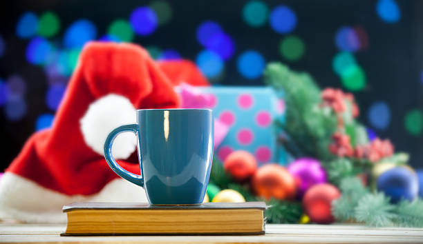istock Cup of tea or coffee on a book 490984902