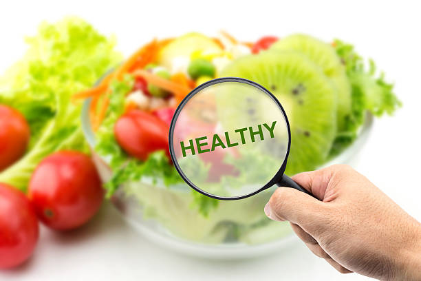 istock Magnifier on fresh salad healthy 490987412