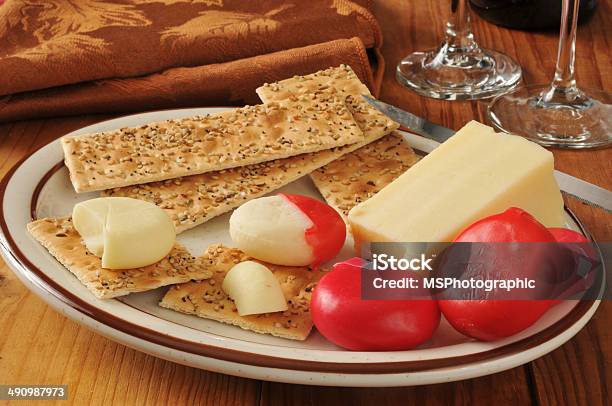 Asiago And Assorted Cheeses Stock Photo - Download Image Now - Asiago - Cheese, Cheddar Cheese, Cheese