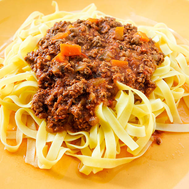 istock Italian meat sauce pasta on the table 490988009