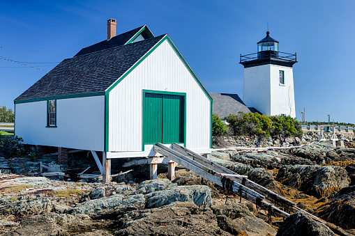 The Grindel Point Light in Islesboro, Maine, USA on a sunny day.