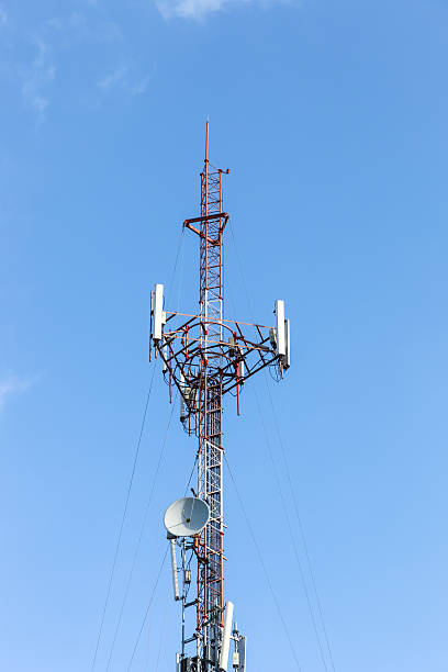 istock Antenna transmission tower with clear blue sky. 490988950