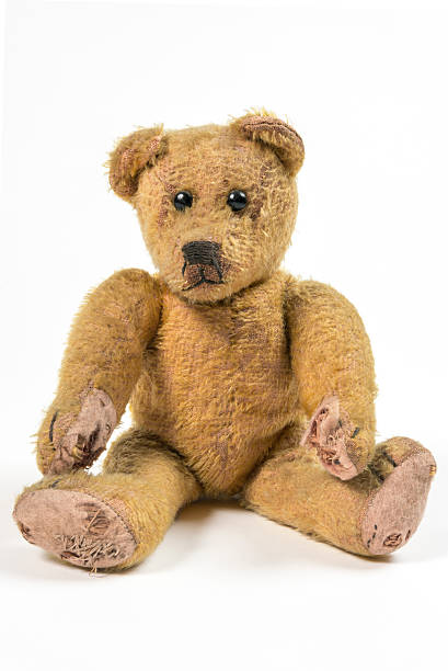 Old rotten straw Teddy bear Nostalgic and lonesome Teddy bear behavior teddy bear doll old stock pictures, royalty-free photos & images