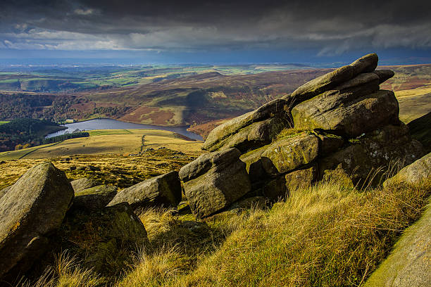 Kinder Reservoir from the flanks of Kinder Scout Kinder Reservoir from the flanks of Kinder Scout in the Peak District National Park peak district national park photos stock pictures, royalty-free photos & images
