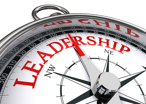 leadership conceptual compass stock photo