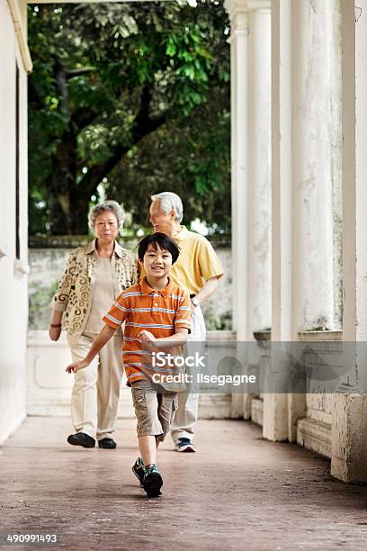 Grandparents With Grandson Stock Photo - Download Image Now - Hong Kong, 60-69 Years, Active Seniors