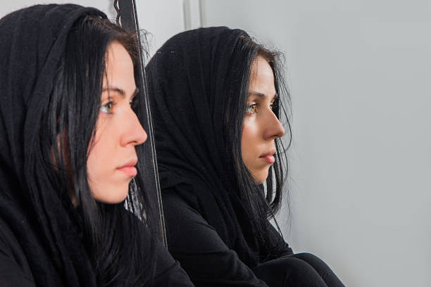 istock Serious young woman with covered hair 490991874