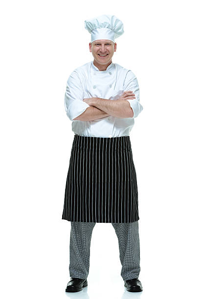 istock Smiling chef looking at camera with arms crossed 490991875