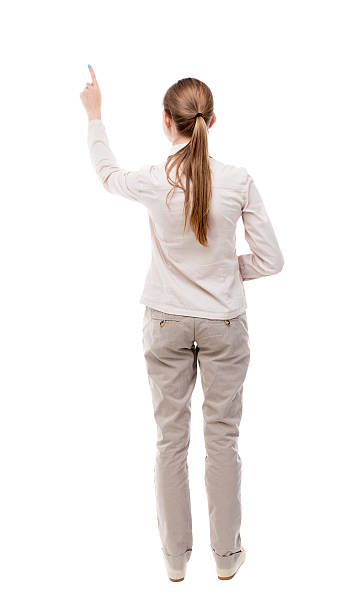 istock Back view of  pointing woman. 490994656