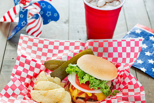 Loaded cheeseburger at a patriotic themed BBQ