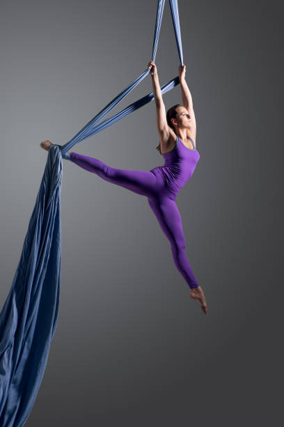 Girl performing aerial silk dance stock photo