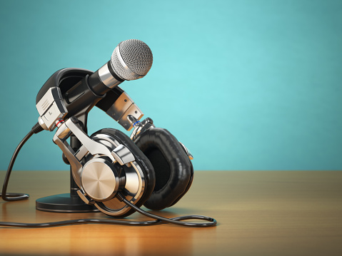 Microphone and headphones. Audio recording or radio commentator concept. 3d
